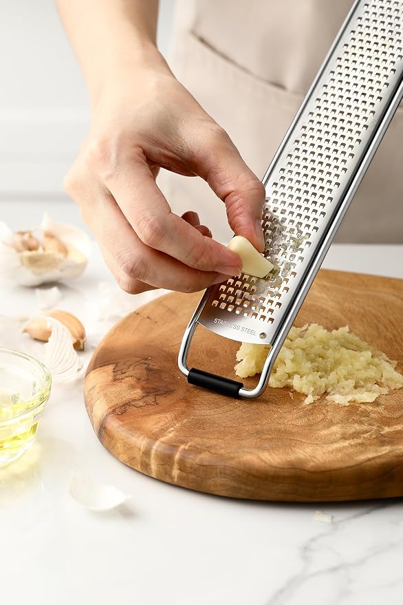 Spring Chef Stainless Steel Lemon Zester Grater with Handle - Garlic, Cheese, Parmesan, Nutmeg, Lime, Ginger Grater - Heavy Duty Kitchen Tool - Citrus Zester with Blade Cover - Fine Shred - Black