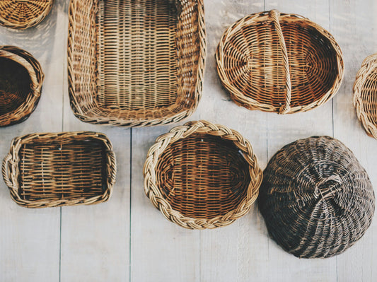 A selection of brown woven storage baskets