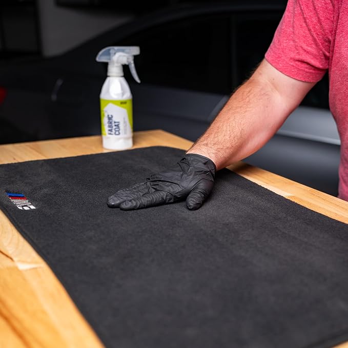Gyeon Quartz Fabric Coat Super‑Hydrophobic UV‑Resistant Ceramic Textile Pro | Super-hydrophobic ceramic textile protectant repels stains and supports self-cleaning protection on upholstery and fabric