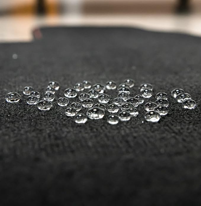 Gyeon Quartz Fabric Coat Super‑Hydrophobic UV‑Resistant Ceramic Textile Pro | Super-hydrophobic ceramic textile protectant repels stains and supports self-cleaning protection on upholstery and fabric