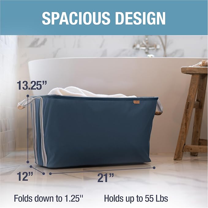 CleverMade LUXE Collapsible Laundry Basket, 60L, 2 Pack, Navy | Refined fabric and vegan leather accents elevate visible storage. Each basket supports 55 lb and folds flat.