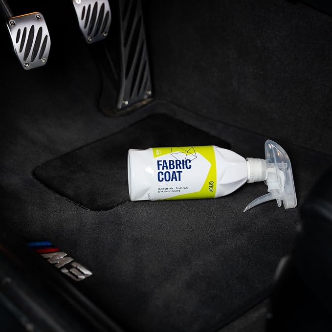 Gyeon Quartz Fabric Coat Super‑Hydrophobic UV‑Resistant Ceramic Textile Pro | Super-hydrophobic ceramic textile protectant repels stains and supports self-cleaning protection on upholstery and fabric