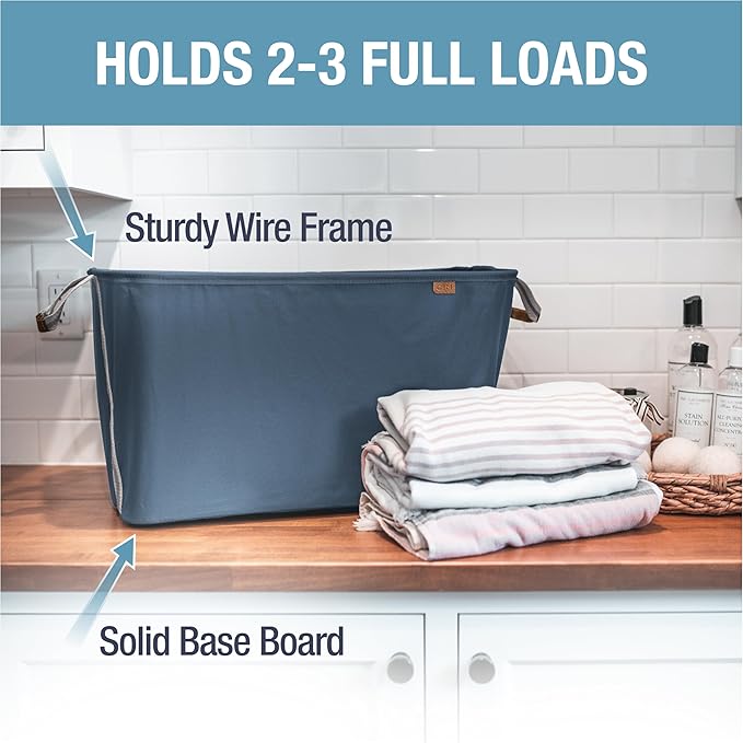 CleverMade LUXE Collapsible Laundry Basket, 60L, 2 Pack, Navy | Refined fabric and vegan leather accents elevate visible storage. Each basket supports 55 lb and folds flat.