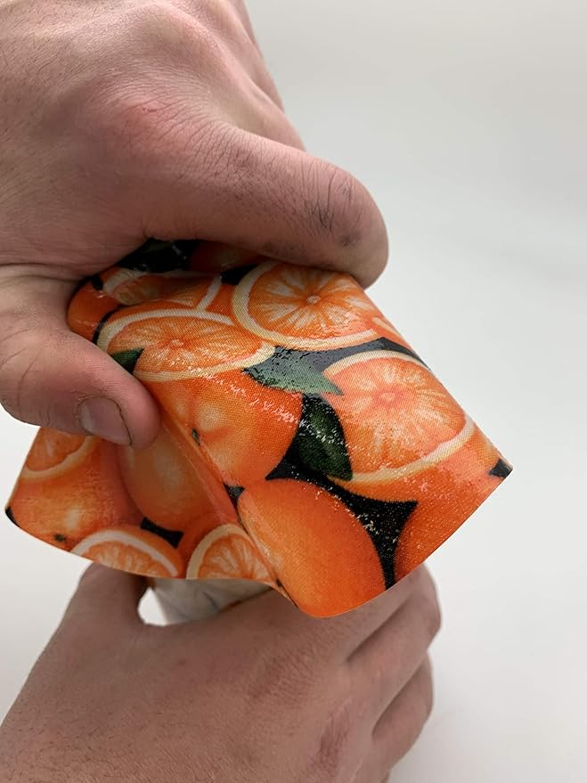 Andreas Silicone Jar Opener, Oranges – 6.25" Non-Slip Lid Gripper & Garlic Peeler, Dishwasher Safe, Multi-Use, Durable Silicone & Fabric, Made in the USA, JO-923