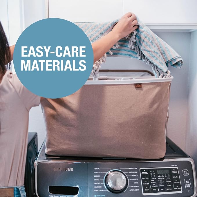 CleverMade LUXE Collapsible Laundry Basket, 60L, 2 Pack, Mocha | Cotton-blend fabric and vegan leather accents elevate visible storage. Each basket supports 55 lb and folds flat.