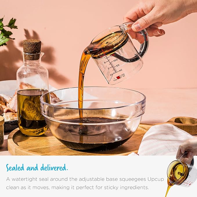 Dreamfarm Upcup All-in-1 Adjustable Measuring Cup, Metric & Imperial Measurements up to 1 Cup - Black/Clear | Measures dry and liquid ingredients and scrapes itself clean, easy-to-read metric and imperial measurements, microwave safe