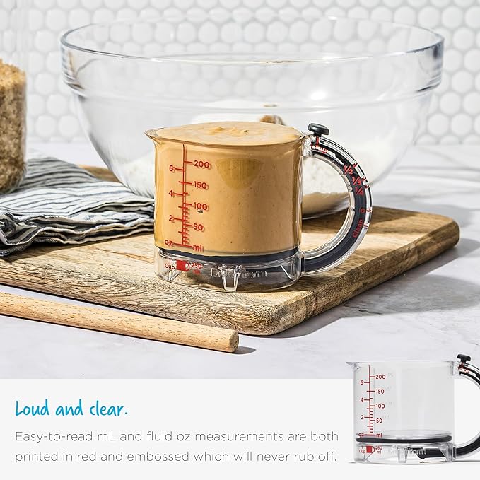 Dreamfarm Upcup All-in-1 Adjustable Measuring Cup, Metric & Imperial Measurements up to 1 Cup - Black/Clear | Measures dry and liquid ingredients and scrapes itself clean, easy-to-read metric and imperial measurements, microwave safe