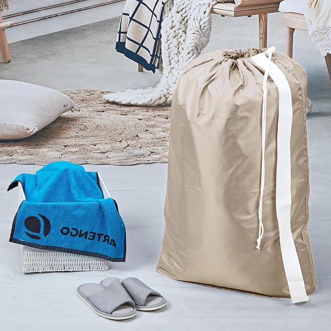 HOMEST XL Nylon Laundry Bag with Strap, Large Dirty Clothes Organizer, Easy Fit a Laundry Hamper or Basket, Can Carry Up to 4 Loads of Laundry, Beige | Heavy-duty nylon material supports bulky garments and daily transport between baskets and storage ar...