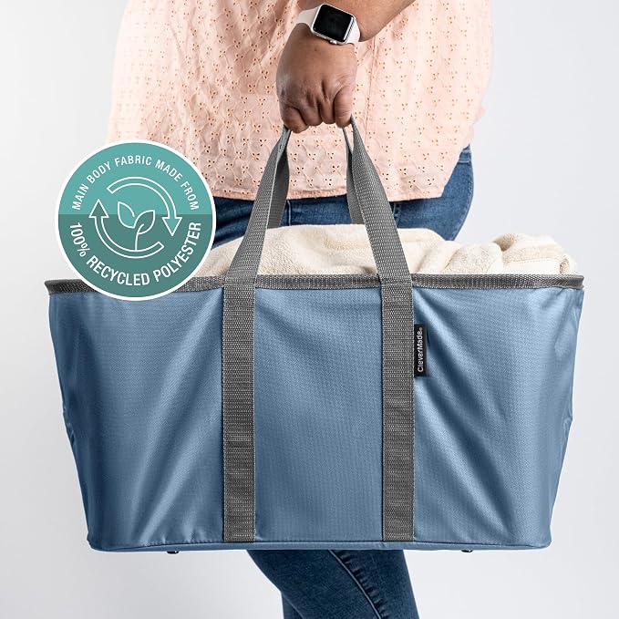 CleverMade Collapsible Laundry Tote, 50L, 2 Pack, Denim | Long center handles balance one-hand carrying. A steel rim supports 55 lb, then folds to 1.25 inches for compact storage.